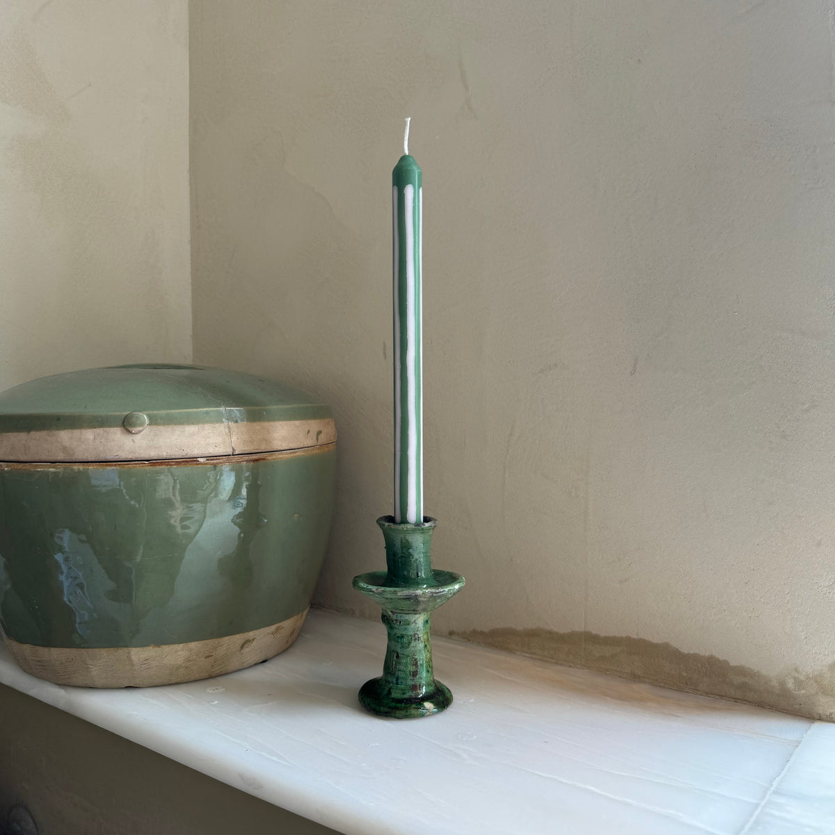 Wimbledon striped dinner candles by Pygmalion London, a hand-poured pair in palest oyster pink and emerald green