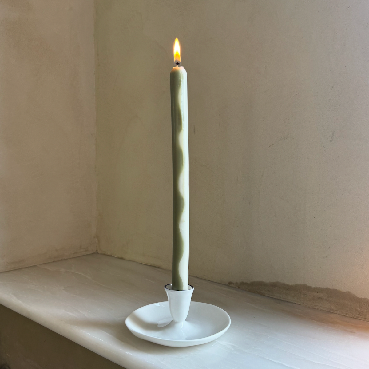 Gardener wavy dinner candles by Pygmalion London, a hand-poured pair in garden green