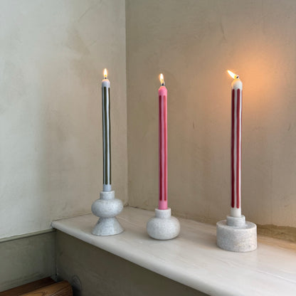 Rhubarb striped dinner candles by Pygmalion London, a hand-poured pair in red and parlour pink