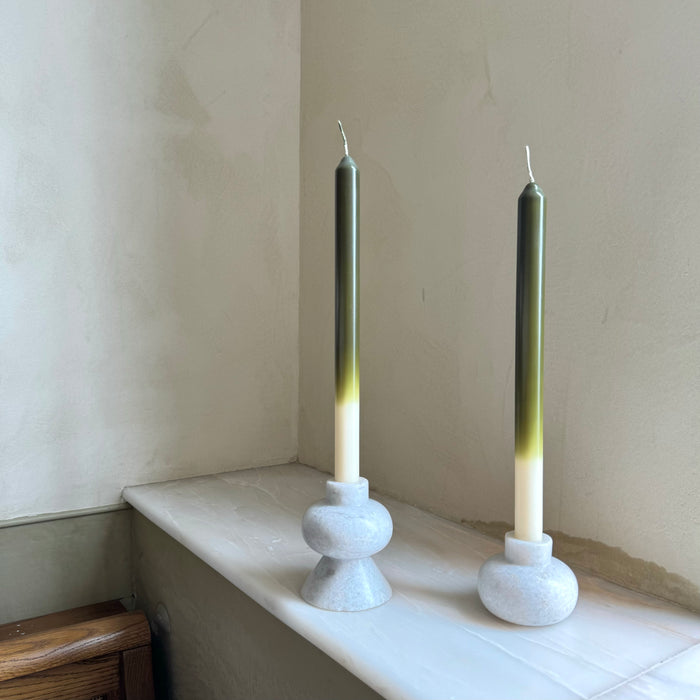 Olives ombré dinner candles by Pygmalion London, a hand-poured pair in deep olive green, chartreuse and off-white