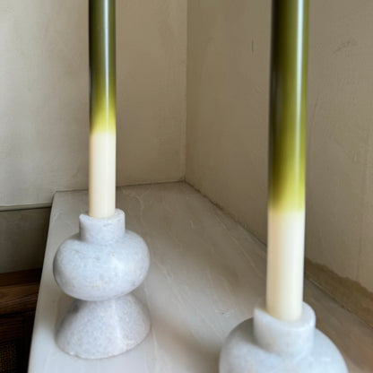 Olives ombré dinner candles by Pygmalion London, a hand-poured pair in deep olive green, chartreuse and off-white
