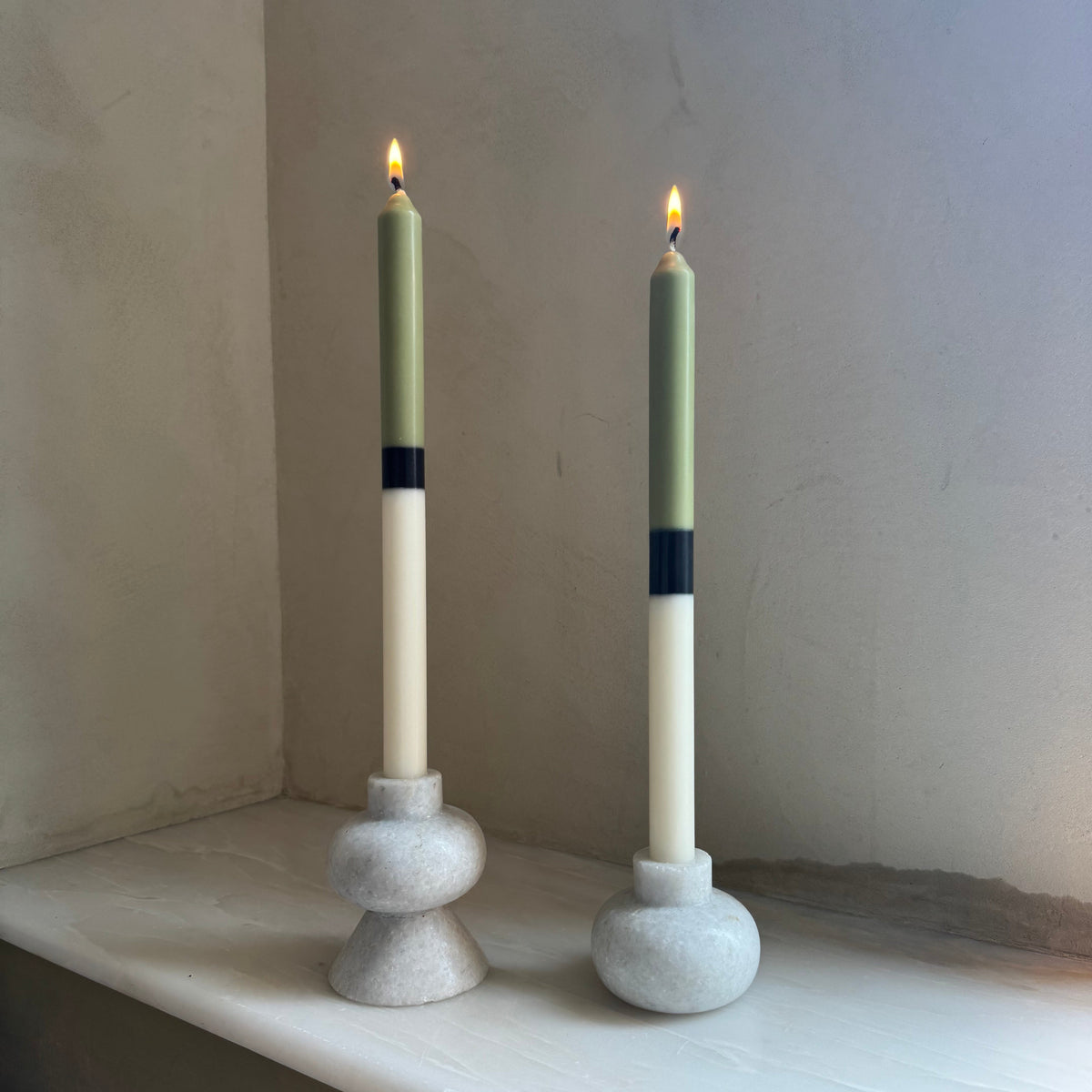 Potting Shed colour block dinner candles by Pygmalion London, a hand-poured pair in sage green, charcoal and off-white