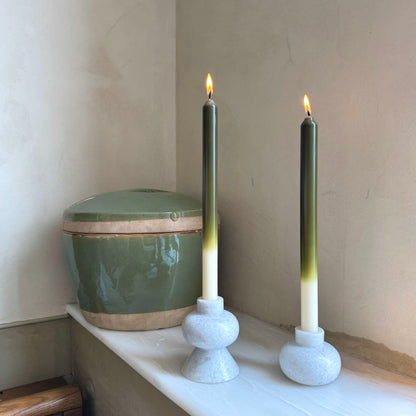 Olives ombré dinner candles by Pygmalion London, a hand-poured pair in deep olive green, chartreuse and off-white