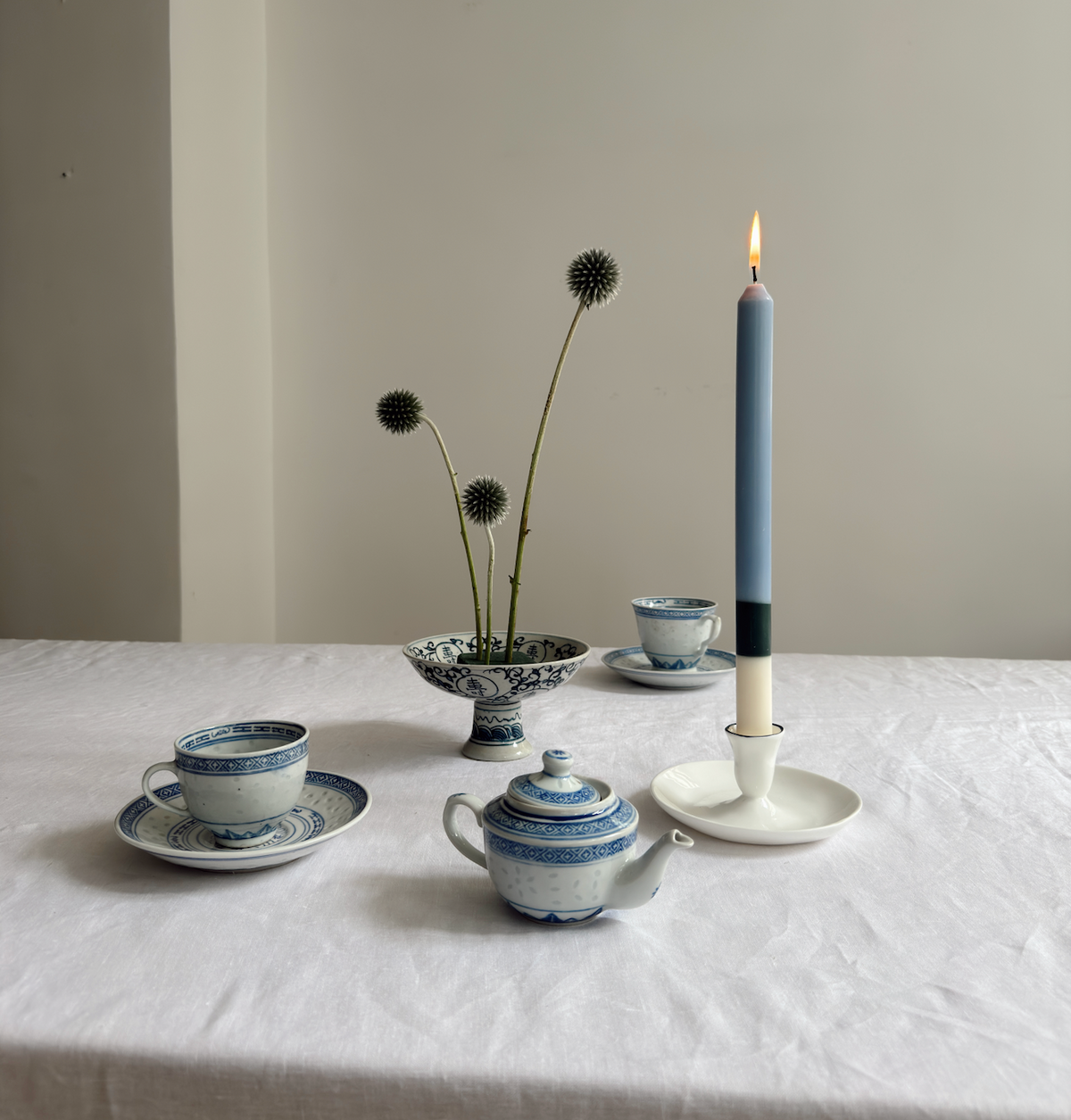 Highbury colour block dinner candles by Pygmalion London, a hand-poured pair in off-white, racing green and steel blue