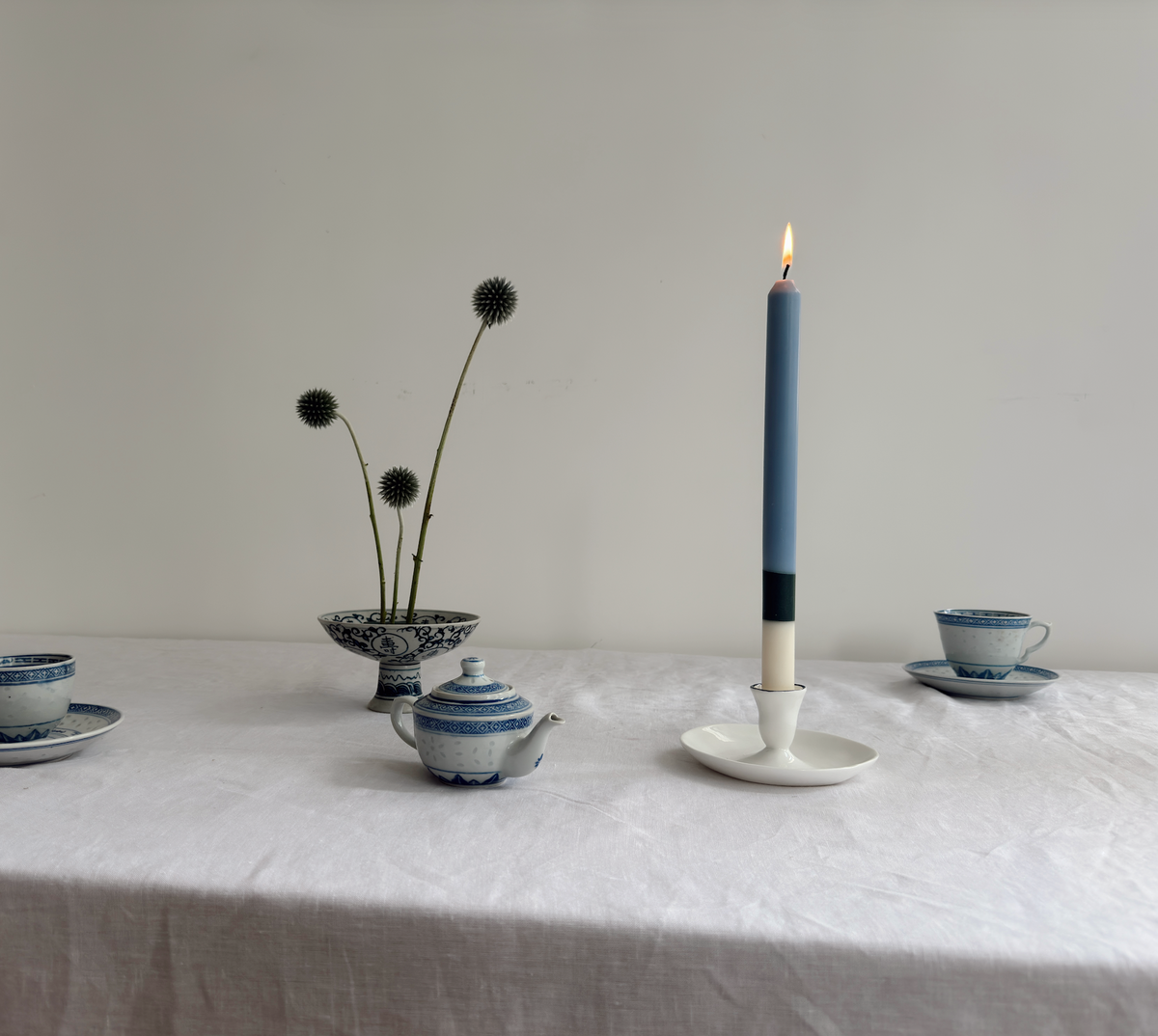 Highbury colour block dinner candles by Pygmalion London, a hand-poured pair in off-white, racing green and steel blue