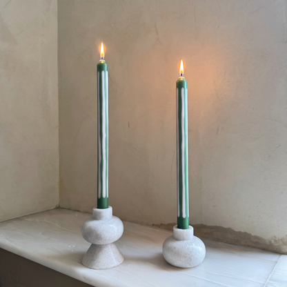 Wimbledon striped dinner candles by Pygmalion London, a hand-poured pair in palest oyster pink and emerald green